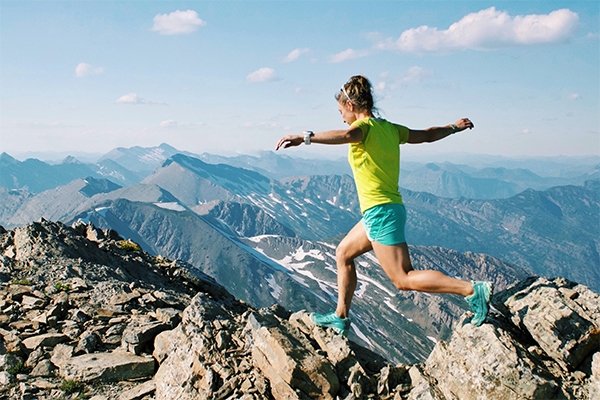 Kristina Pattison running on summit
