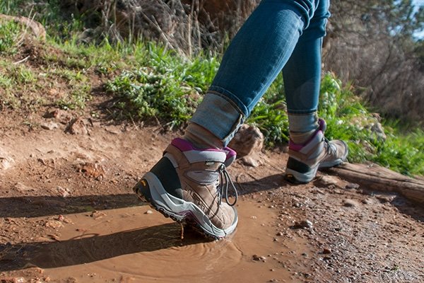 Trekking through puddle in La Sportiva hiking boots