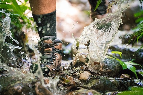 La Sportiva hiking boots tromping through stream