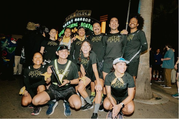 Runners in a group photo at the start of their race