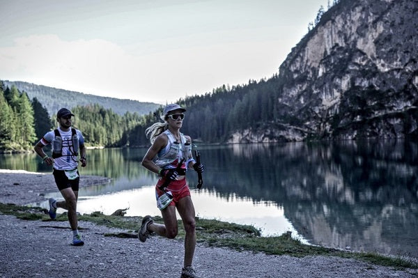 Kelly Wolf and friend running around Lago di Braies