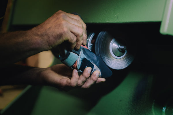 Shoe to be resoled on grinder