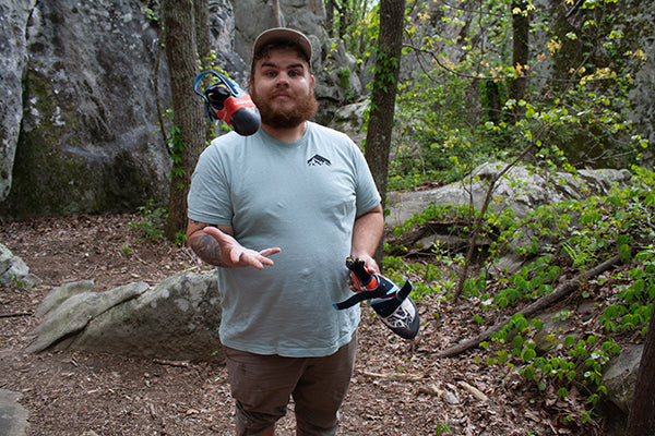 Drew Hulsey outside getting ready to climb
