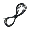 Une paire de La Sportiva Shoelaces-Olympus Mons/Spantik Outerboot en noir avec de petits points jaunes, soigneusement enroulés en forme de huit, présentés sur un fond blanc.