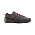 The La Sportiva TX4 EVO is a black technical approach shoe with red accents and laces, featuring rugged Vibram Megagrip tread, shown in side profile against a white background.