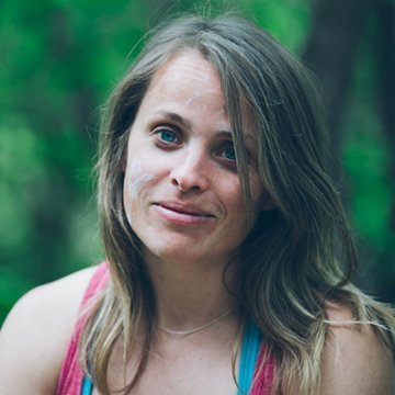 Woman with long hair outdoors in a natural setting