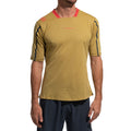 A man stands against a plain white background wearing the La Sportiva Trail Bite T-Shirt Men's in yellow with red accents, featuring a textured, moisture-wicking fabric and fitted style, paired with dark blue shorts—perfect for trail running.