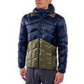 A person wearing the La Sportiva Pinnacle Down Jacket Men’s, featuring blue and olive green colors, reflective details, and an adjustable hood, stands against a plain white background.