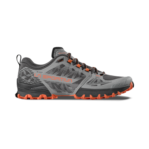 The La Sportiva Bushido III GTX is a high-performance trail running shoe in gray and black with orange accents, rugged tread, and Gore-Tex technology for superior waterproof protection, featuring the La Sportiva logo on the side.