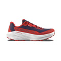 A side view of the La Sportiva Prodigio 2 GTX mountain running shoe in navy blue and red, featuring a thick white sole and La Sportiva branding on the upper. The shoe showcases red accents, textured mesh fabric, and is designed as a durable GORE-TEX running shoe for enhanced waterproof performance on the trails.